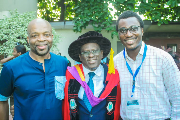 Dr. Herbert and speaker and lab member.